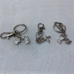 image of silver doggy themed charms